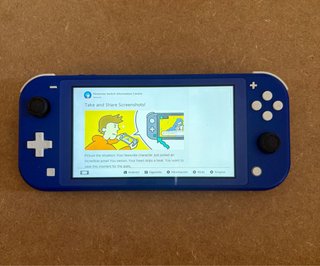 PACCHETTO NINTENDO SWITCH LITE + GIOCO + CARICABATTERIE