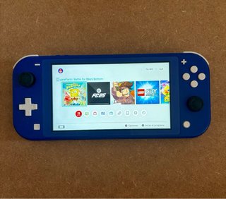 PACCHETTO NINTENDO SWITCH LITE + GIOCO + CARICABATTERIE