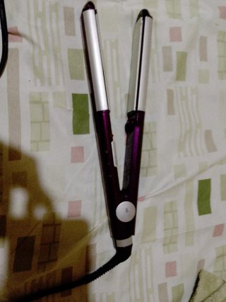 Plancha de pelo BaByliss púrpura y plateada