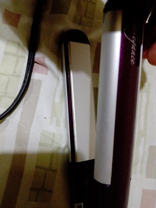 Plancha de pelo BaByliss púrpura y plateada