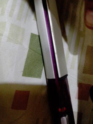 Plancha de pelo BaByliss púrpura y plateada