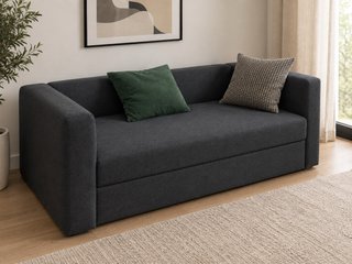Sofá cama gris con cojines