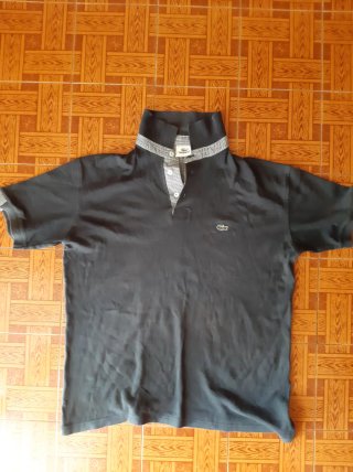 Polo Lacoste nero manica corta