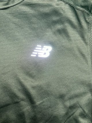 Camiseta New Balance verde y amarilla