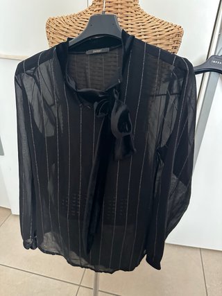 Blusa Charget nera con fiocco