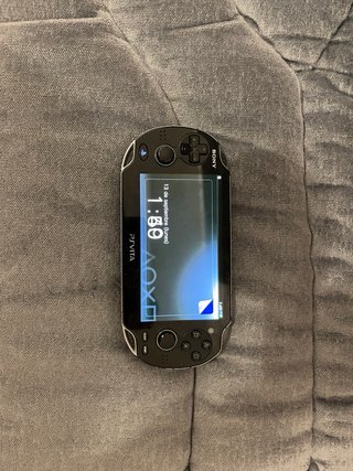 PS Vita OLED PCH-1004 + 7 giochi + scheda 16GB