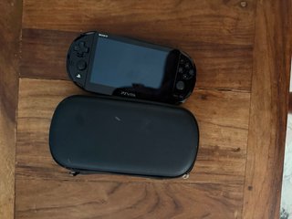 Consola Sony PS Vita Negra con magia