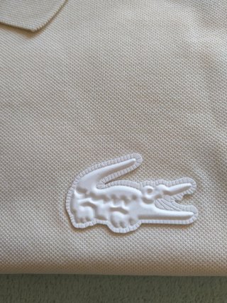 Polo unisex Lacoste oversize 130 €