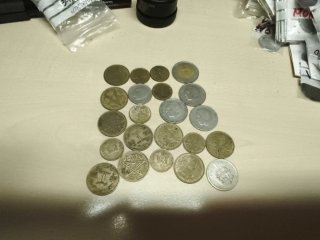 Lote de 22 monedas antiguas de Marruecos.