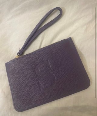 Pochette in pelle con iniziale S