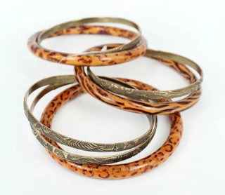 Braccialetti settimanali in legno e metallo