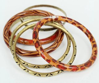 Braccialetti settimanali in legno e metallo