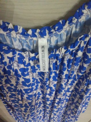 Vestito smanicato fantasia floreale