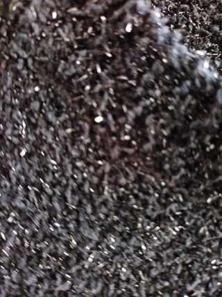 Maglione nero con luccichini