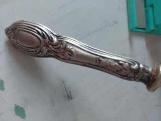 Cucharón antiguo de plata