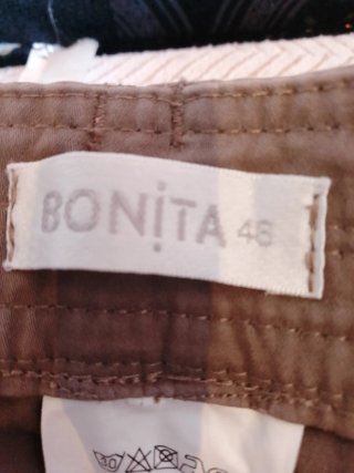 Pantalones negros mujer con botones dorados