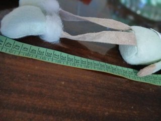Pupazzo renna peluche con cappello e sciarpa