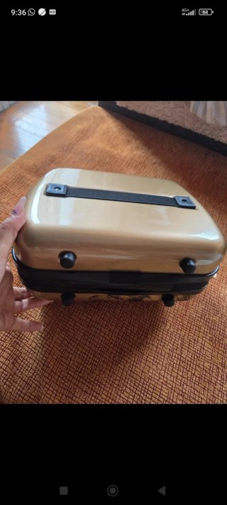 Maletín maquillaje alas doradas