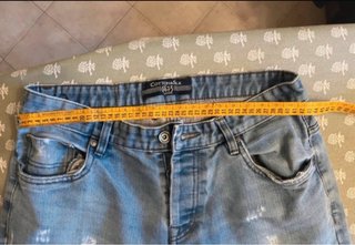 Jeans uomo strappati