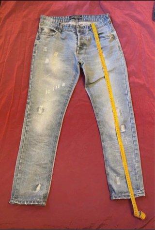 Jeans uomo strappati