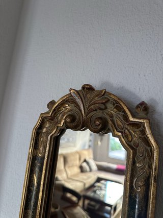 Espejo decorativo dorado y negro