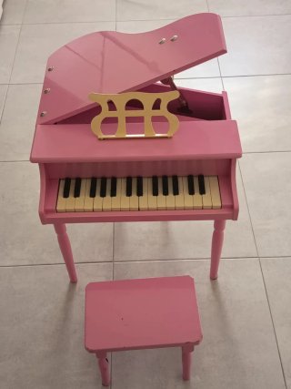 Piano de cola rosa para niños