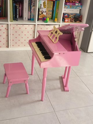 Piano de cola rosa para niños