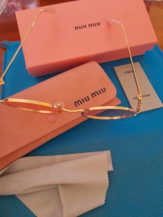 Occhiali da sole Miu Miu dorati e rosa