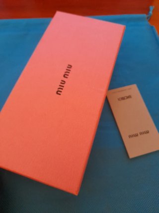 Occhiali da sole Miu Miu dorati e rosa