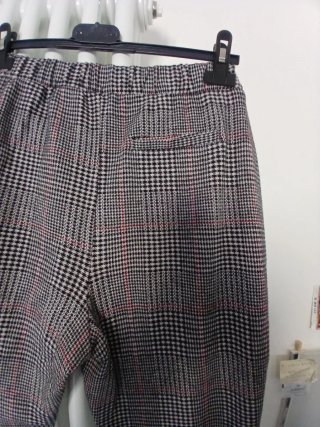 Leggings fantasia quadri grigi e rossi