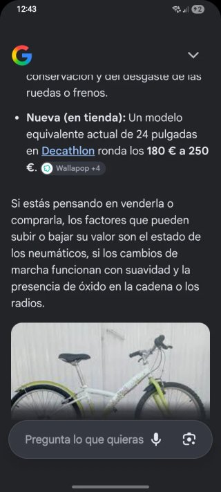 Bicicleta de mujer verde y blanca