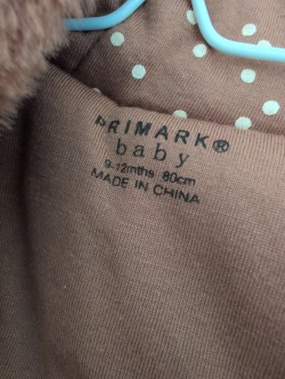 Buzo bebé marrón Primark 9-12 meses