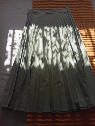Falda verde de tablas