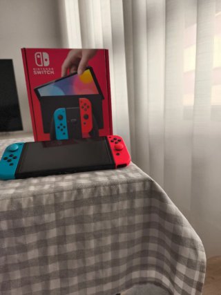 Nintendo Switch OLED Azul/Rojo con todo incluido