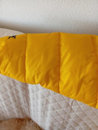 Plumón Helly Hansen reversible amarillo
