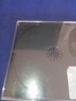 Caja PS1 + Juego Moto Racer (No Funciona)