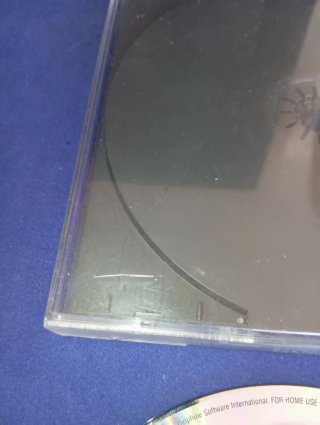 Caja PS1 + Juego Moto Racer (No Funciona)