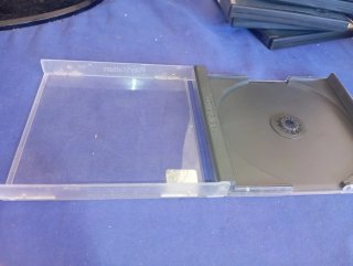 Caja PS1 + Juego Moto Racer (No Funciona)