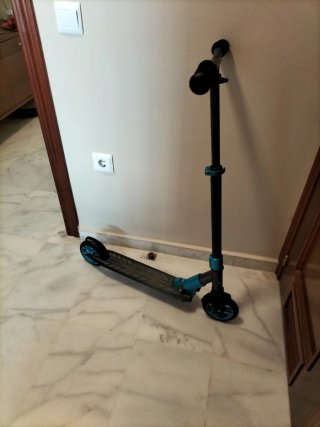 Patinete plegable unisex azul y negro