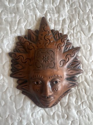 Maschera viso a forma di sole da parete