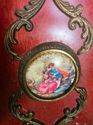 Mueble de entrada antiguo de madera y mármol