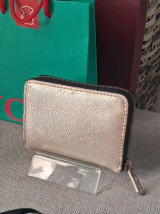 Conjunto Tous: monedero, gafas y pendientes