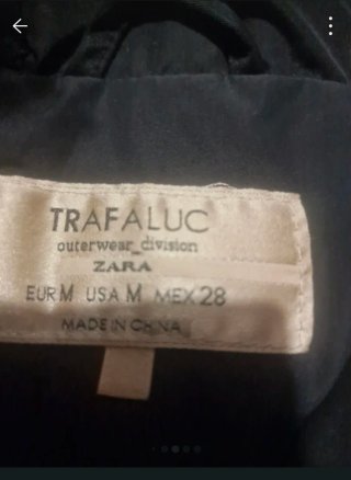 Abrigo acolchado con capucha Zara mujer