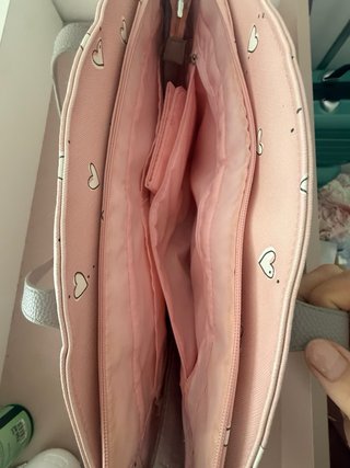 Bolso bebé rosa con corazones