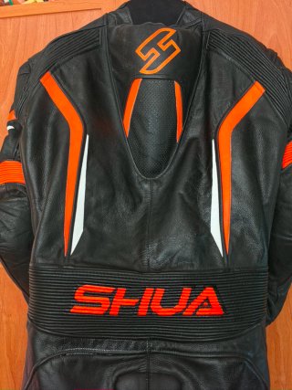 Mono de moto Shua Negro/Naranja Talla 52