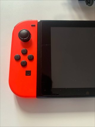 Nintendo Switch con caricatore originale