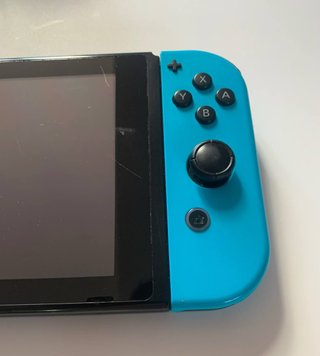 Nintendo Switch con caricatore originale