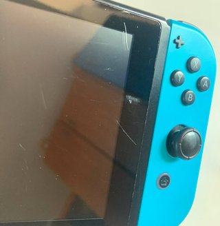 Nintendo Switch con caricatore originale