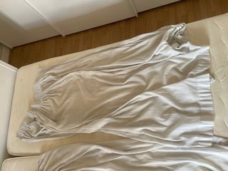 Tenda da sole in tessuto beige e bianco