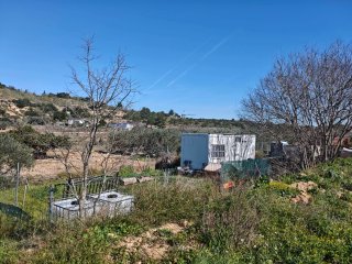 Terreno con caseta